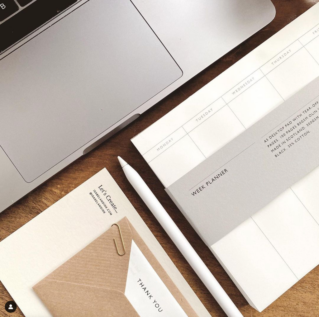 Instagram photo by @isabelandink showing her Mark+Fold Week planner and laptop