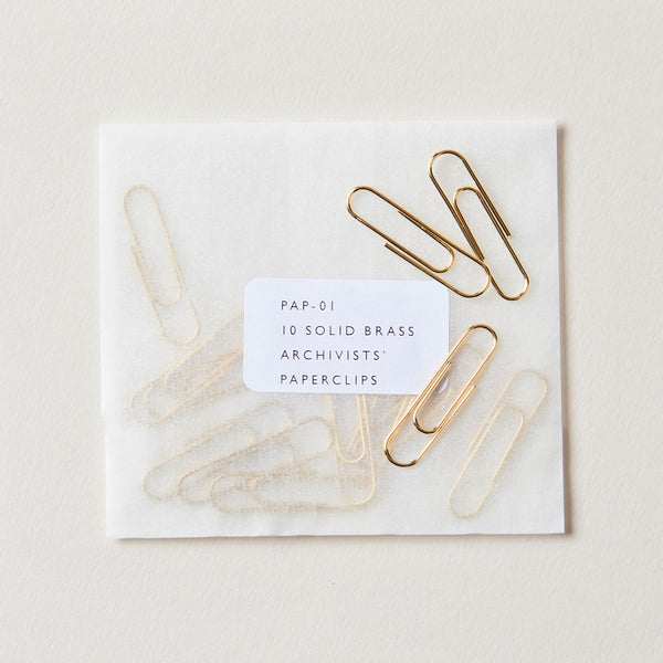 Solid Brass Paperclips. Made for archivists and librarians, will not tarnish delicate paper. Available at markandfold.mom
